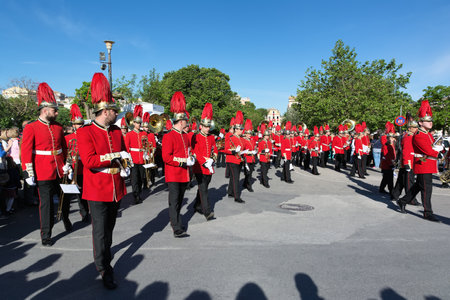 CORFU, GREECE - APRIL 30, 2016: Philharmonic musicians playing in Corfu Easter holiday celebrations. Corfu has a great tradition in music, with 18 philharmonic bands playing a major role on the island's music education and culture.のeditorial素材