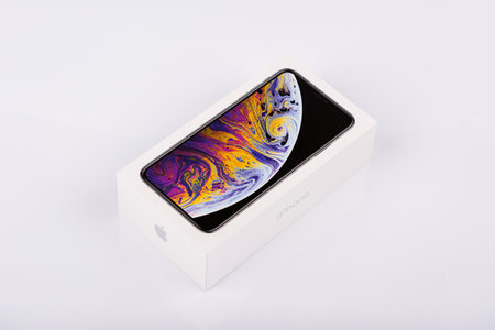 BURGAS, BULGARIA - NOVEMBER 8, 2018: Apple iPhone Xs Max Silver box on white background, front view.のeditorial素材