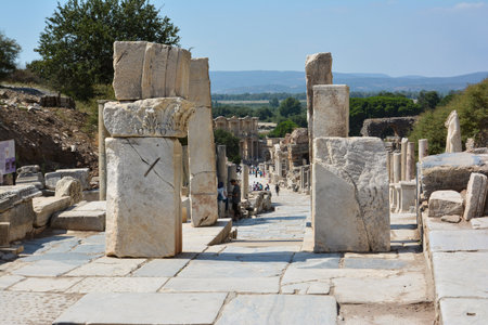 EPHESUS, TURKEY - AUGUST 16, 2017: Curetes Street in Ephesus ancient city, Selcuk, Turkey. Hercules Gate.のeditorial素材