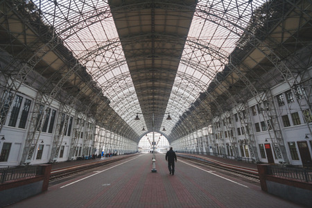 Russia, Moscow -  Spring 2007: Kiyevsky railway terminal. One person walks on a platformのeditorial素材