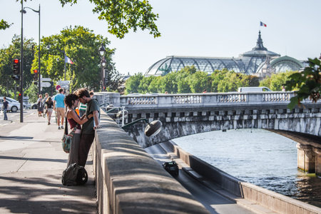 Paris, France - August 2010: People on the streets of the French capital