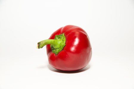 One red  pepper on a white backgroundの写真素材