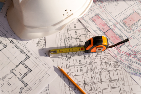 In the construction drawing are pencil, helmet and rouletteの写真素材