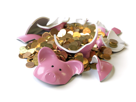 Piggy bank with coins brokenの写真素材