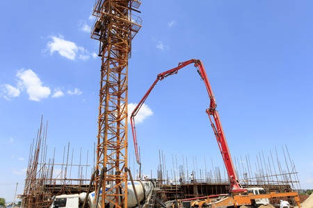 Crane in work at the construction siteの写真素材
