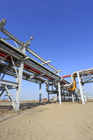 Oil field scene, oil pipeline under the blue skyの写真素材