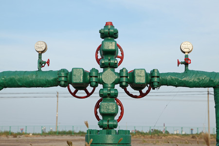 Piping and valves of oil field, close-upの写真素材