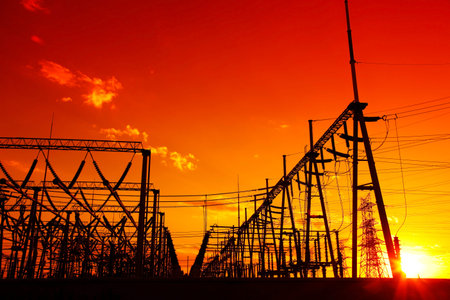 The silhouette of the evening high voltage substations