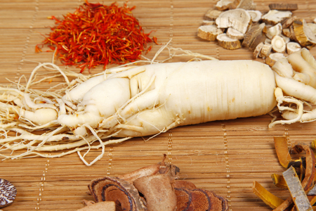 Traditional Chinese medicine and ginseng, close-upの写真素材