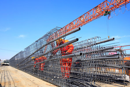 In the construction site, the welding workers at work