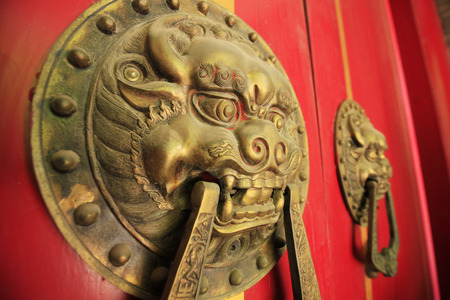 Ancient Chinese architecture copper door knockerの写真素材