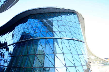 Glass curtain wall of modern office buildingのeditorial素材