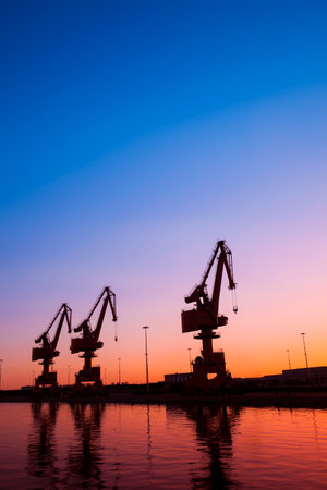 In the evening, gantry crane at the dockのeditorial素材