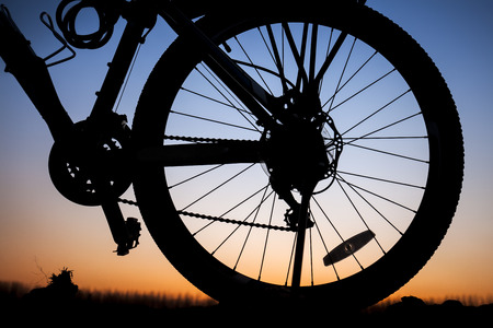 The silhouette of mountain bikeの写真素材