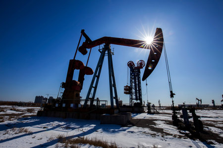 Oil field, oil pump in the workの写真素材