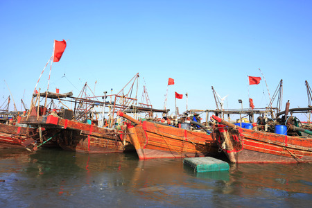 Fishing boats in the harbourの写真素材