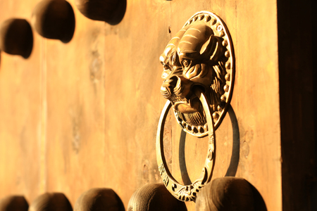 Ancient Chinese architecture copper door knockerの写真素材