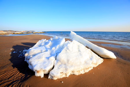 Ice and snow are on the beach