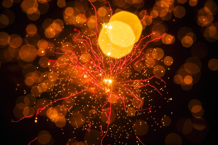 Colorful fireworks explode at nightの写真素材