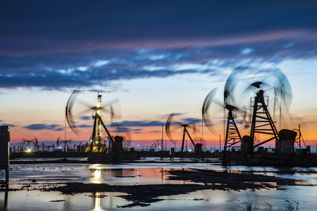 Oil field site in the eveningの写真素材