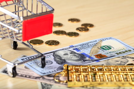 Gold abacus and the dollarの写真素材
