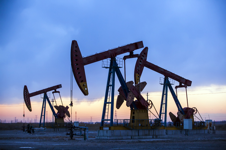 the silhouette of the oil pumpの写真素材