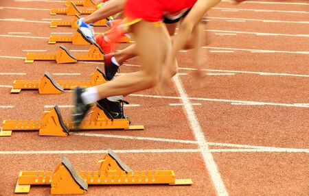 sprint start in track and field in blurred motionの写真素材