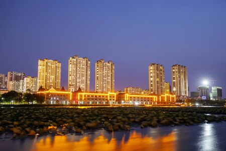 The city at night is by the riverの写真素材