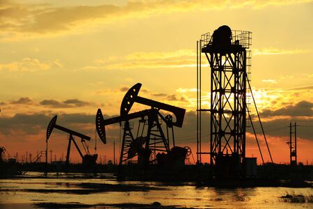 Oil field site in the eveningの写真素材