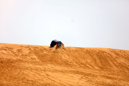 Off-road vehicle traveling in the desert