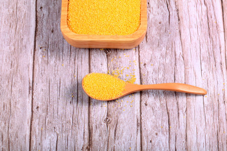 Millet, millet in a wooden container