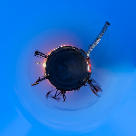 A 360-degree view of the oil field at night, oil pumps at night, Oil field site, in the evening, oil...