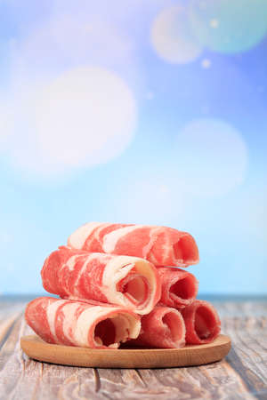 Fresh mutton was rolled up on a plateの写真素材