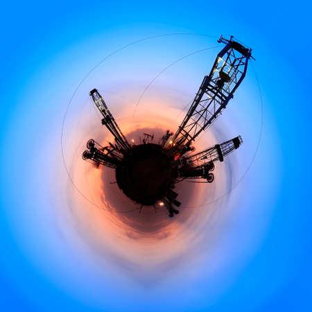 A 360-degree view of the oil field at night, oil pumps at night, Oil field site, in the evening, oil pumps are running, 360-degree panoramaの写真素材