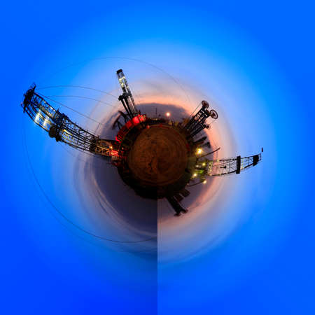 A 360-degree view of the oil field at night, oil pumps at night, Oil field site, in the evening, oil pumps are running, 360-degree panoramaの写真素材