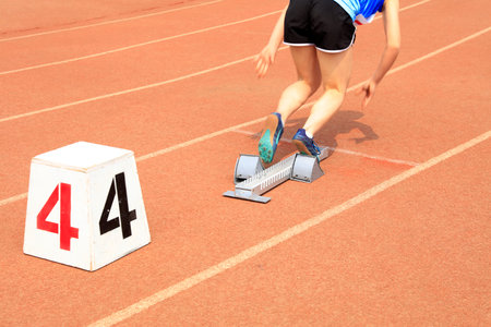 Sports meeting, the athlete sprint start, The sprinters are at the starting lineの写真素材