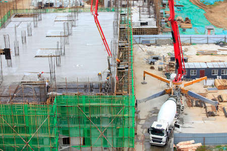 The construction site is under the blue sky, Construction site, the building is under constructionの写真素材