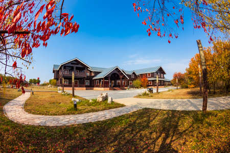 Wood villas in autumn, Wooden houses in autumnの写真素材