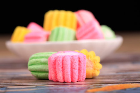 Candies of all colors are on the plate