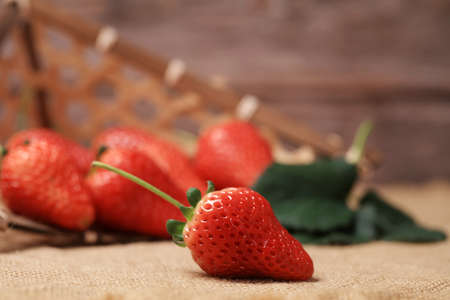 Fresh strawberries on the plate, fresh strawberries on the table, close-upの写真素材