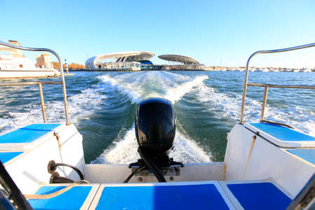 The boat is in the dock, the boat is moving, the yacht is in the dockの写真素材