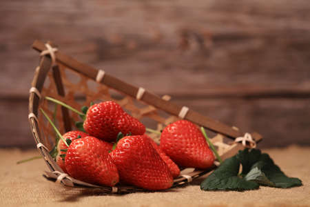 Fresh strawberries on the plate, fresh strawberries on the table, close-upの写真素材