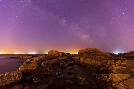 Seaside scenery, sea at night and beautiful Milky Wayの写真素材