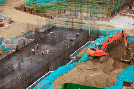 Workers work on construction sites, workers build residential buildingsの写真素材