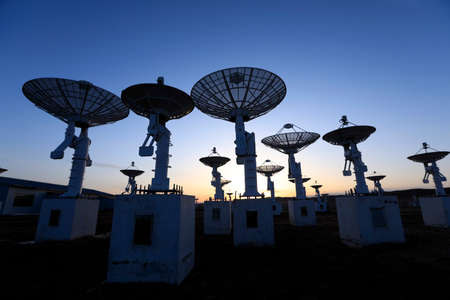 The observatory in the evening, The silhouette of a radio telescopeの写真素材