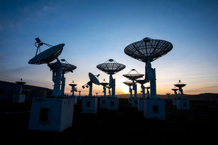 The observatory in the evening, The silhouette of a radio telescopeの写真素材