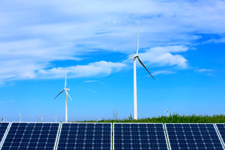 Solar photovoltaic panels and wind turbines. Energy conceptの写真素材