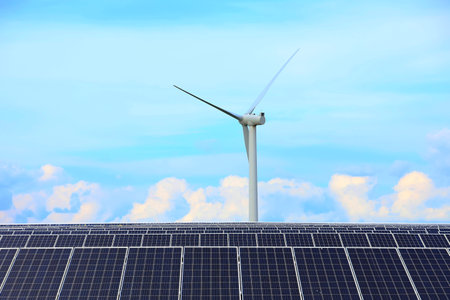 Solar photovoltaic panels and wind turbines. Energy conceptの写真素材