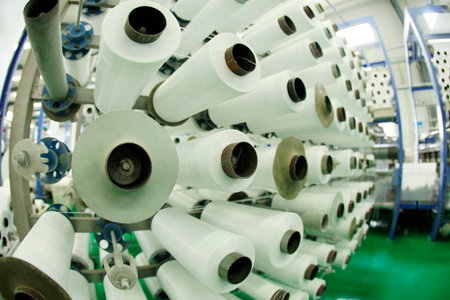 Packaging bag production workshop, The production workshop of woven belt, A factory workshop where textile belts are producedの写真素材