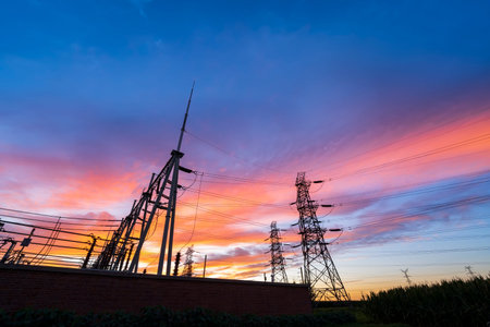 Substation in the evening, the silhouette of the power supply facilities, High voltage substation...